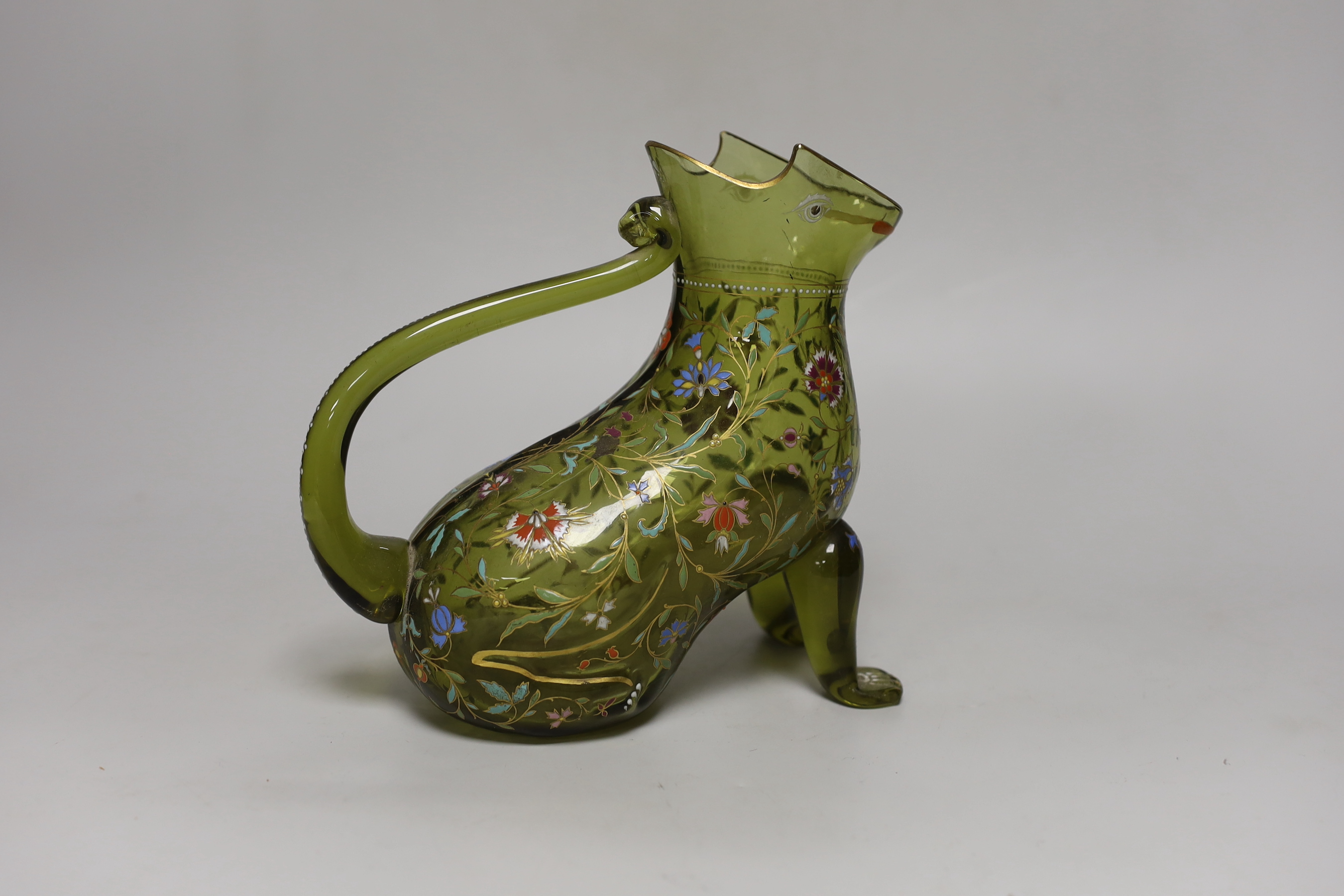 A Moser type zoomorphic enamelled glass jug in the form of a seated cat, 18cm high